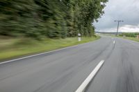 Road in Germany: A View of Asphalt and Clouds