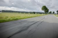 Road in Germany: A View of Asphalt and Clouds