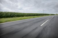 Road in Germany: A View of Asphalt and Clouds