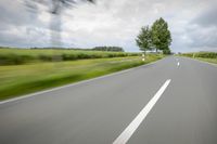 Road in Germany: A View of Asphalt and Clouds