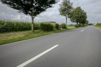 Road in Germany: A View of Asphalt and Clouds