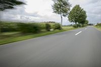 Road in Germany: A View of Asphalt and Clouds
