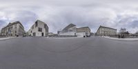 this is a fish eye view of some buildings in the middle of nowhere, there are no trees yet,