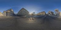 a 360 view of the street in front of an architectural building, with multiple windows