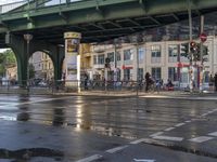 the view under the highway, on a rainy day of the city street and on the streets with buildings and bicycles