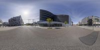 this is a spherical panoramic view of a city street on the left side of a building