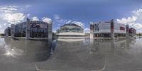 360 - view of the plaza, with reflections of buildings and a sky background in the foreground