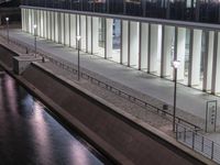 Germany's Urban High-Rise Reflections: A Nighttime View of Berlin