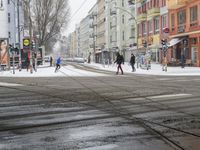 there is snow all over the street in the city of prague and this picture can be seen in europe