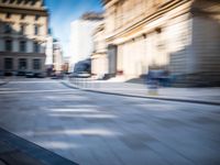 blurry picture taken from the front seat of a parked vehicle on an empty street