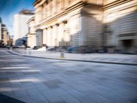 blurry picture taken from the front seat of a parked vehicle on an empty street