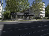 the building near the tracks is modern and empty by itself, but for a few years now there are no people or animals on the street