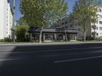 the building near the tracks is modern and empty by itself, but for a few years now there are no people or animals on the street