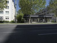 the building near the tracks is modern and empty by itself, but for a few years now there are no people or animals on the street