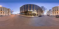 a fish - eye view of the outside of a storefront area in a city