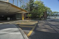 a parking garage with no cars or motorcycles parked on it's side outside in front of a building