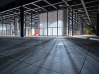 an empty building is lit up with the sun's rays hitting it down on its exterior