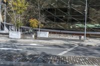 the street has some small bricks on it that can be seen in front of a building