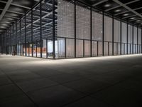 empty glass and metal structure with no people inside or outside the structure's ceiling