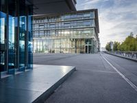 A Glass Wall Office Building with Reflections in Hamburg