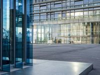A Glass Wall Office Building with Reflections in Hamburg