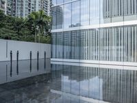 Glass-Walled Building with City Reflection