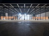 the large open space with no windows has an area for people to sit and stand on