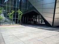 a large building has an entry way to it as a sign points out for you