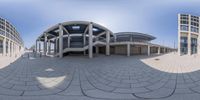 a 360 - view of a building with a bunch of glass walls and lots of windows