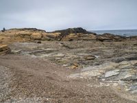 Gloomy Coastal Landscape with Gravel and Boulder in the USA