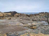 Gloomy Coastal Landscape with Gravel and Boulder in the USA