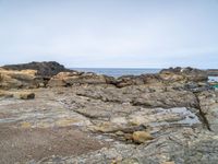 Gloomy Coastal Landscape with Gravel and Boulder in the USA