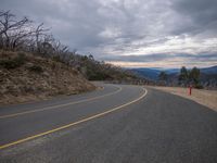 Gloomy Day Asphalt Road in Mountain Landscape 001