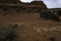 Gloomy Day Landscape with Low Clouds over Desert Terrain