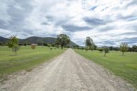 dirt roads mean to make out dirt on the plains near mountains in australia's western highlands