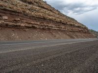 A Gloomy Day in Utah: Asphalt Road Through the Forest