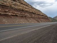 A Gloomy Day in Utah: Asphalt Road Through the Forest