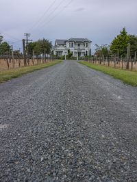 Gloomy Landscape: Dirt Road and Cloudy Sky