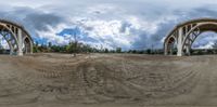 a mirror image with a view of an old road construction site with the sky in the background