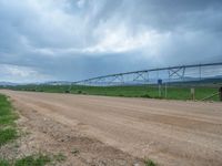 Gloomy Rural Landscape in Utah: A View of a Dirt Road