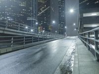 Night view of Los Angeles cityscape with modern architecture and glowing street lights