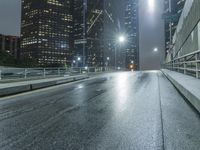 Night view of Los Angeles cityscape with modern architecture and glowing street lights