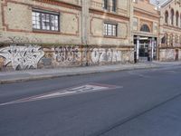 the street has been tagged with graffiti for good reason by the law that it is