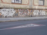 the street has been tagged with graffiti for good reason by the law that it is