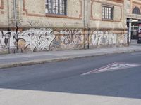 the street has been tagged with graffiti for good reason by the law that it is