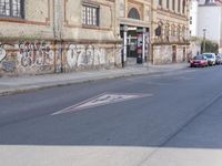the street has been tagged with graffiti for good reason by the law that it is