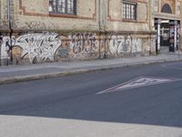 the street has been tagged with graffiti for good reason by the law that it is