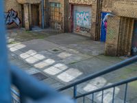 Graffiti and Cobblestones in Berlin Courtyard