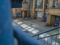 Graffiti and Cobblestones in Berlin Courtyard