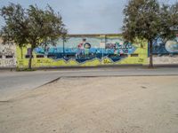 Graffiti-Covered Wall in Barcelona's City Life